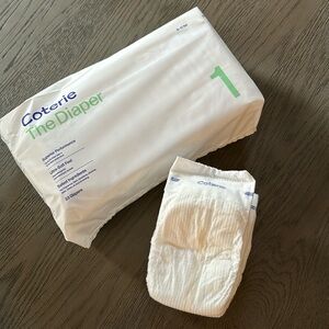 Size 1 coterie diapers, 33 count. Open bag. For babies 8-12 pounds.